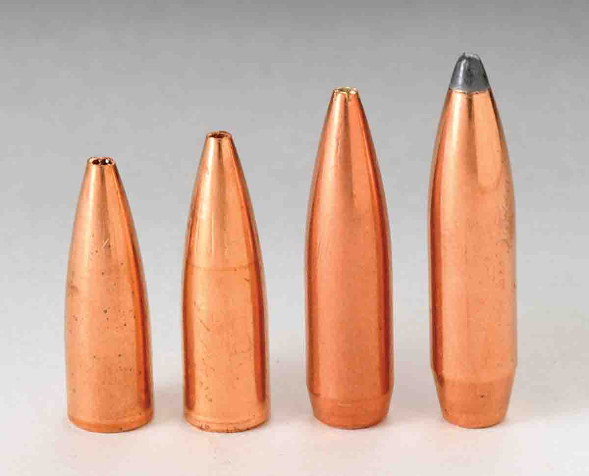 The pair of flatbase 6mm hollowpoint bullets at left include a 65-grain Cook and a 68-grain Berger, both of which are popular for 100- and 200-yard benchrest shooting. At right are two hunting bullets, a Hornady 87-grain boat-tail hollowpoint and a Sierra 100-grain spitzer boat-tail.